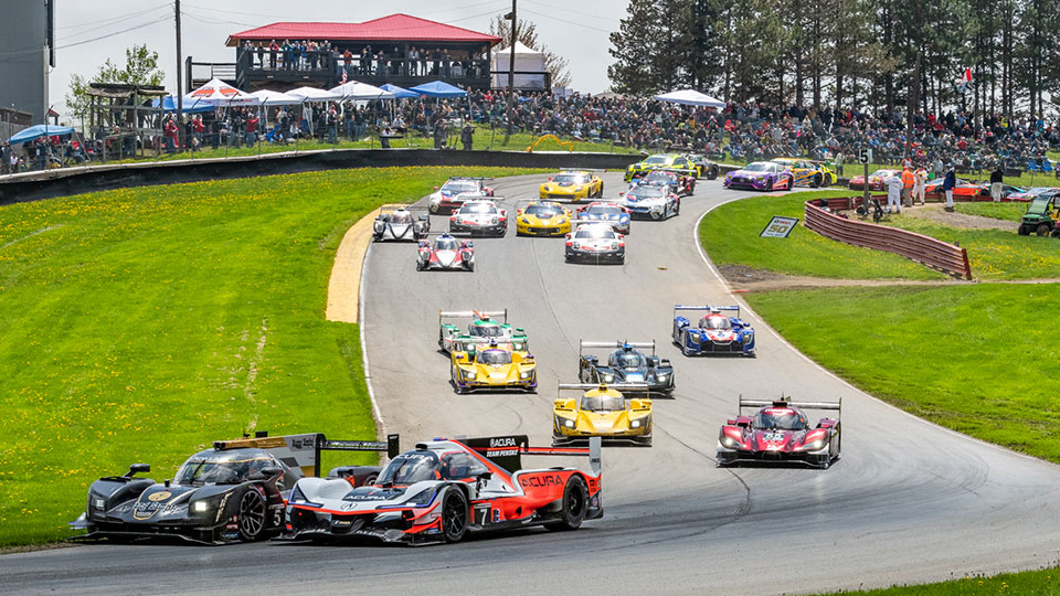 IMSA cars come through the esses at Mid-Ohio Sports Car Course
