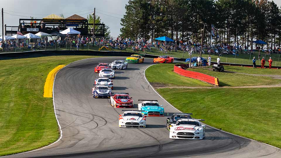 Trans Am cars race through the esses
